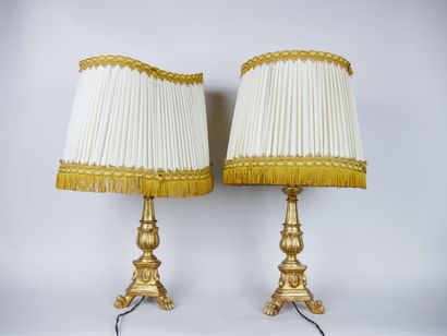 Pair of gilded and carved wood lamp bases...
