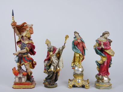 null Lot of 4 religious sculptures in polychrome carved wood representing : 

Saint...