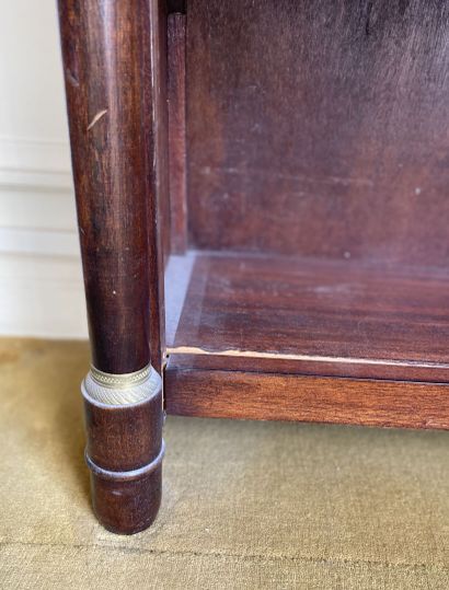 null Mahogany and mahogany veneer bookcase with three adjustable levels, the uprights...