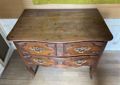 null Chest of drawers, in molded wood, opening with three drawers on two rows separated...