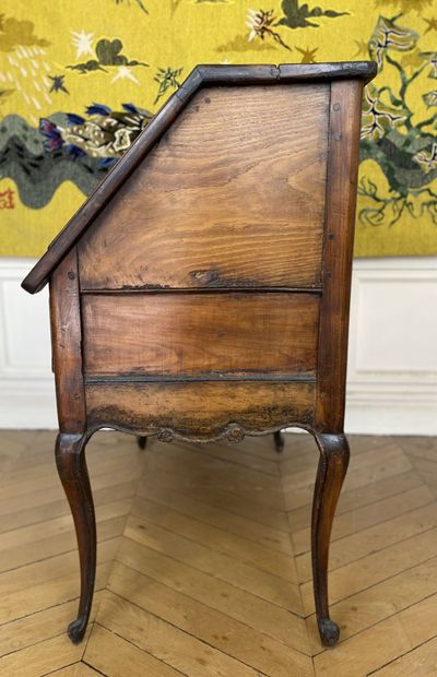 null Sloping secretary in natural wood with molding.

Rustic work composed of old...