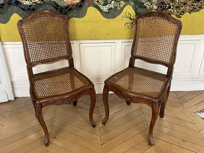 null Pair of caned chairs with flat backs in molded and carved wood decorated with...