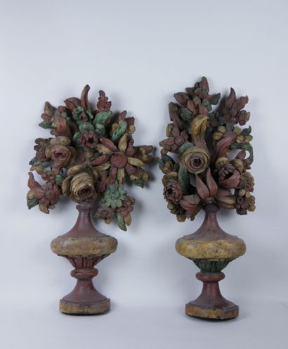 null Pair of polychrome carved wood elements in the form of vases with roses, sunflowers...