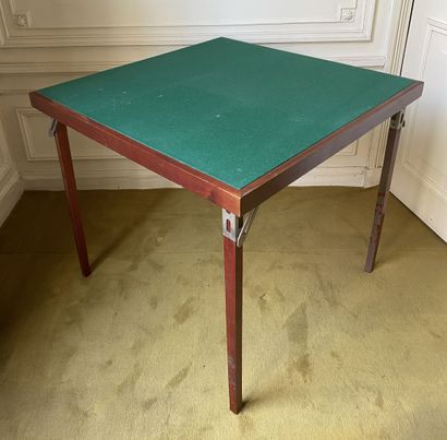 null Two folding game tables in veneer covered with a green felt of the mark MEBLUTIL....