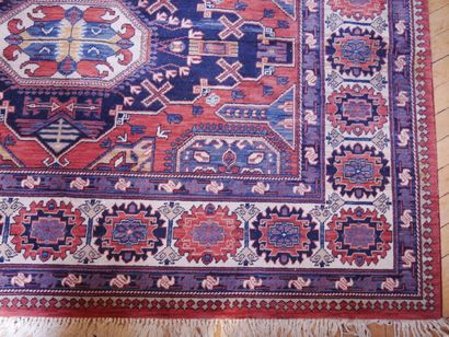 null SOUMAK KADJAR 

Wool carpet with brick red field decorated in the center of...
