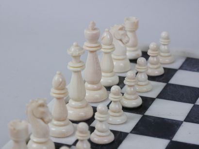 null Black and white alabaster chess board in a white alabaster frame 

Dimensions...
