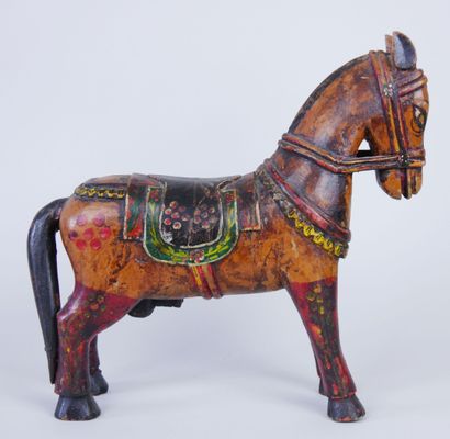 null Two carved and painted polychrome wood horses looking down. Work in the Indian...