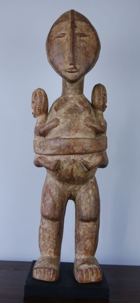 AFRICA 

Wooden maternity sculpture representing...