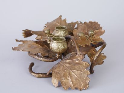 null Table candleholder with two candles in bronze and gilded metal with oak leaves....