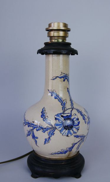 null Pair of lamps in fine cracked earthenware with printed decoration of poppies....