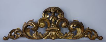 null Carved and gilded wood paneling with foliage decoration. Probably top of a door...