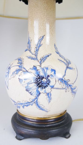 null Pair of lamps in fine cracked earthenware with printed decoration of poppies....
