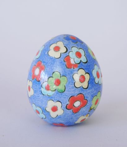 null Suite of 7 ceramic eggs with painted decoration of multicolored flowers or hunting...