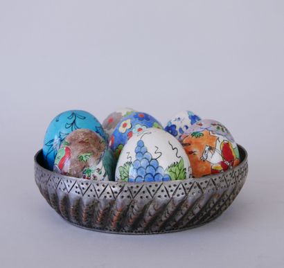 null Suite of 7 ceramic eggs with painted decoration of multicolored flowers or hunting...