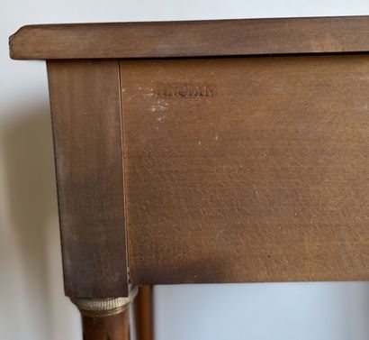 null Bedside table in cherry wood opening to a drawer in belt resting on fluted feet...