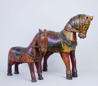 Two carved and painted polychrome wood horses...