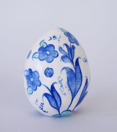 null Suite of 7 ceramic eggs with painted decoration of multicolored flowers or hunting...