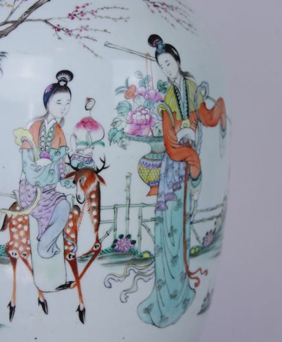  CHINA 
White porcelain baluster vase decorated with maids in a garden accompanied...