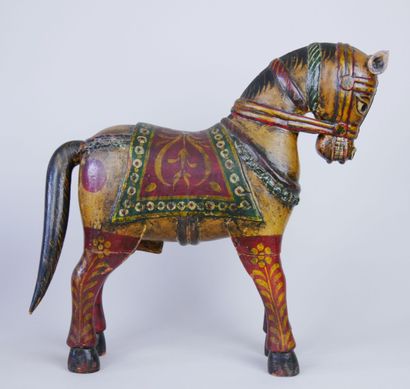 null Two carved and painted polychrome wood horses looking down. Work in the Indian...