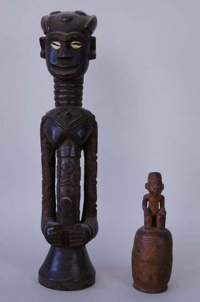 AFRICA 

Two sculptures in carved and stained...