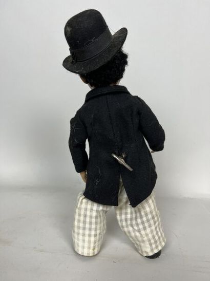 null ROULLET DECAMPS 

Charlie CHAPLIN

Mechanical automaton walking and waddling

Height...