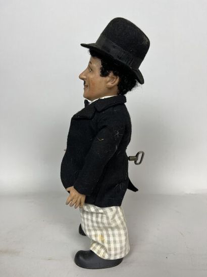 null ROULLET DECAMPS 

Charlie CHAPLIN

Automate mécanique marchant et se dandinant

Hauteur :...