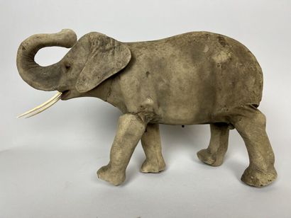 null ROULLET DECAMPS

Elephant walking with straight legs and erect trunk. 

Mechanical...