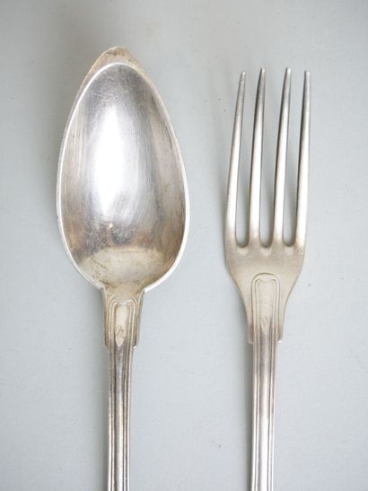 null Suite of silver cutlery 925 thousandths plain, contour and net model, monogrammed,...