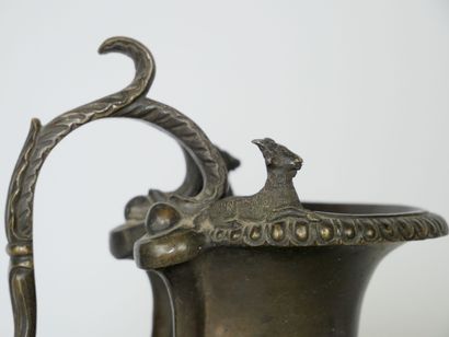 null SIOT Paris 

Bronze pitcher with medal patina decorated with deer. The handle...