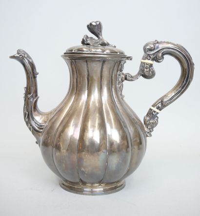 null Teapot in silver 925 thousandths with decoration of gadroons and foliage resting...