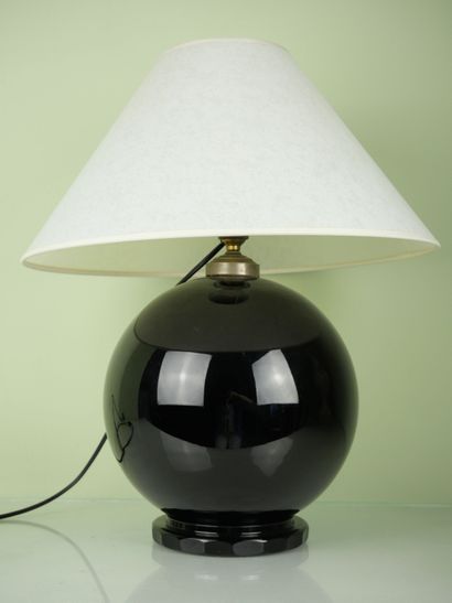 null Ball-shaped lamp stand in black enamelled ceramic resting on a circular base....