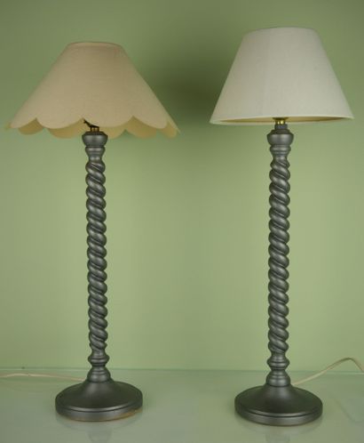 null Pair of lamps in twisted wood lacquered gray resting on a circular base. Modern...