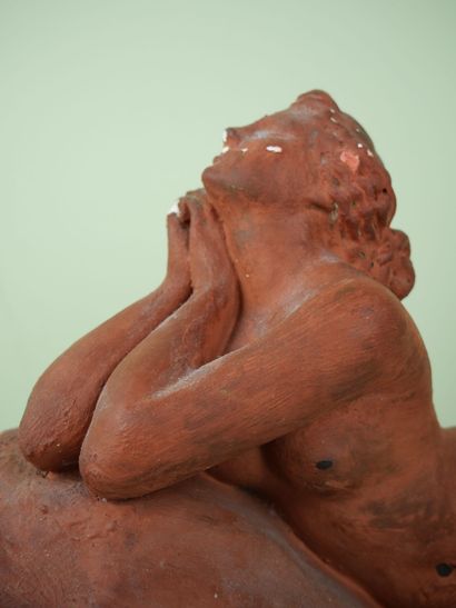 null Sculpture in plaster with a patina imitating terracotta representing a woman...