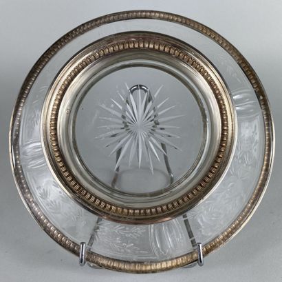 null Two plates of presentation on pedestal out of glass with cut decoration of a...