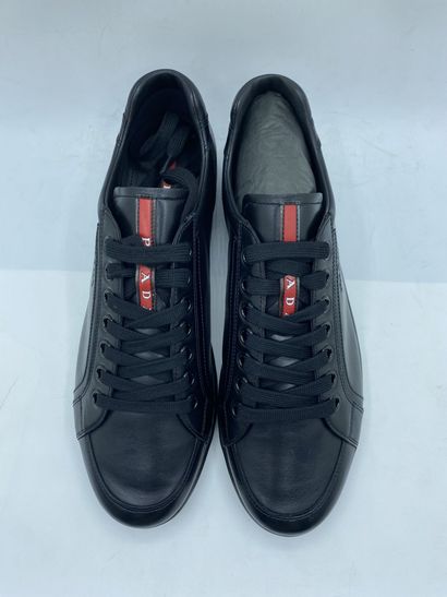 null PRADA, Pair of sneakers model "Plume + Spazzola" black, size 10 (UK size is...