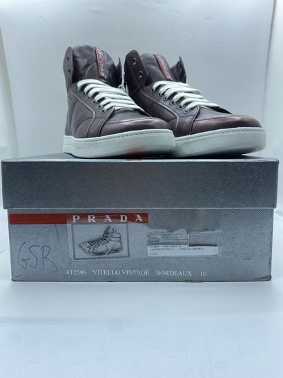 null PRADA, Pair of sneakers model "Vitello Vintag" burgundy color, size 10 (UK size...