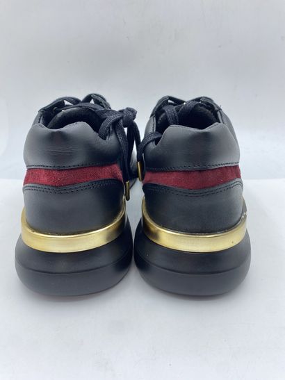null MERCER, Pair of sneakers model "Blackspin" black, red and gold size 44

New...