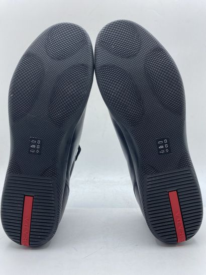 null PRADA, Pair of sneakers model "Plume + Spazzola" black, size 10 (UK size is...