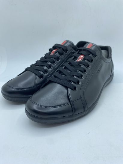 null PRADA, Pair of sneakers model "Plume + Spazzola" black, size 10 (UK size is...