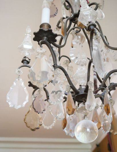 null Chandelier with four arms of light, decorated with colorless and amber crystal...