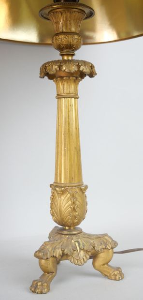 null A pair of ormolu torches resting on a tripod base.

Louis-Philippe period.

(Mounted...