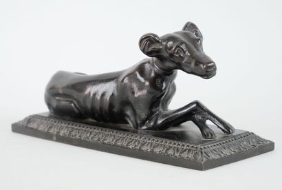 null Paperweight in bronze or metal with black patina representing a greyhound lying...