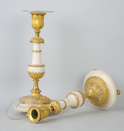 null Pair of candlesticks in white marble and chased and gilt bronze.

End of the...