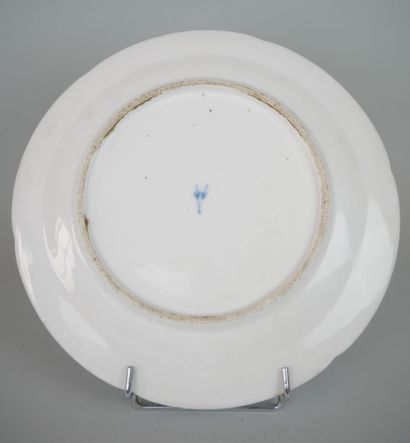 null LOCRE : 

Porcelain plate with polychrome and gold decoration.

Marked.

Eighteenth...