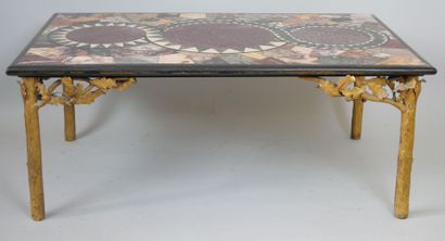 null Rectangular coffee table, the top in black marble with inlaid polychrome marbles...