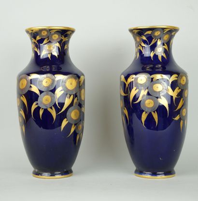 LIMOGES

Pair of blue porcelain vases decorated...