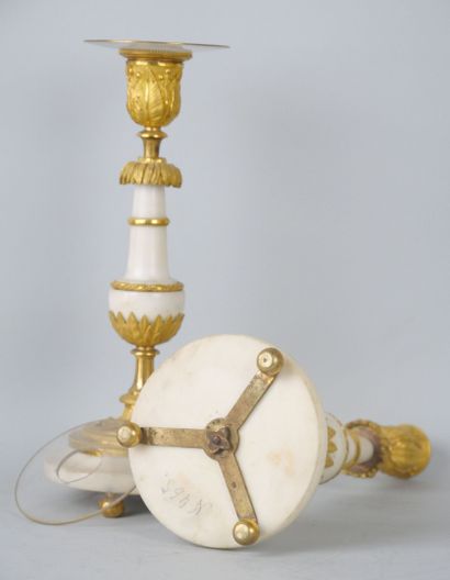 null Pair of candlesticks in white marble and chased and gilt bronze.

End of the...