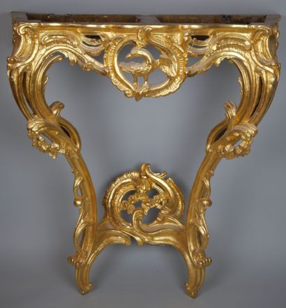 null Carved and gilded wood console, with openwork decoration in the center of an...