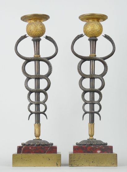 Pair of rare bronze torches with brown patina,...