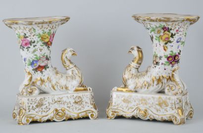 null PARIS :

Pair of Rhyton vases in porcelain with polychrome decoration of flowers.

19th...